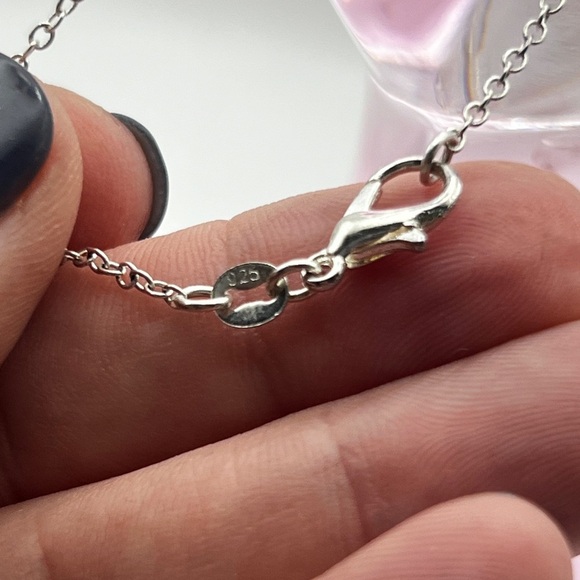 Sterling Silver 925 Textured Cross inside a textured ring - Picture 10 of 10